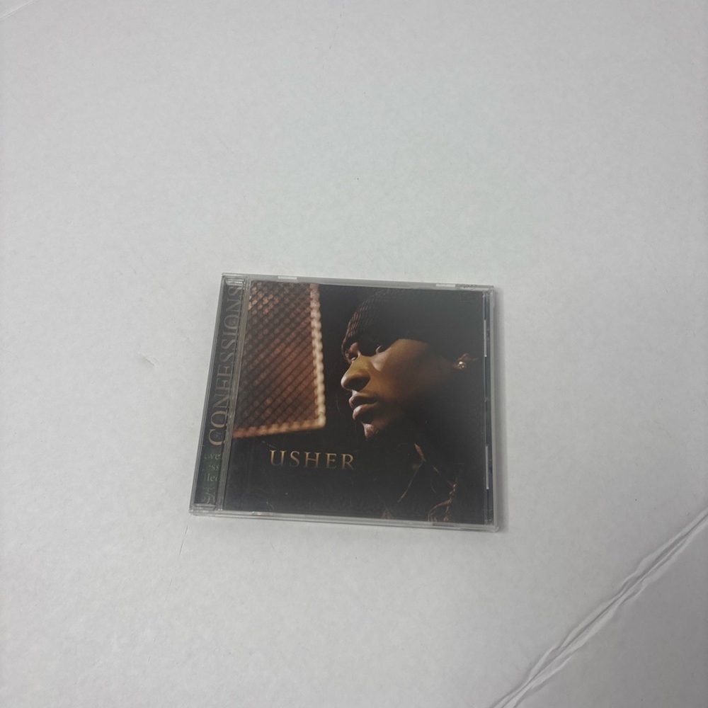 Usher CD with Blue and Gold Artwork